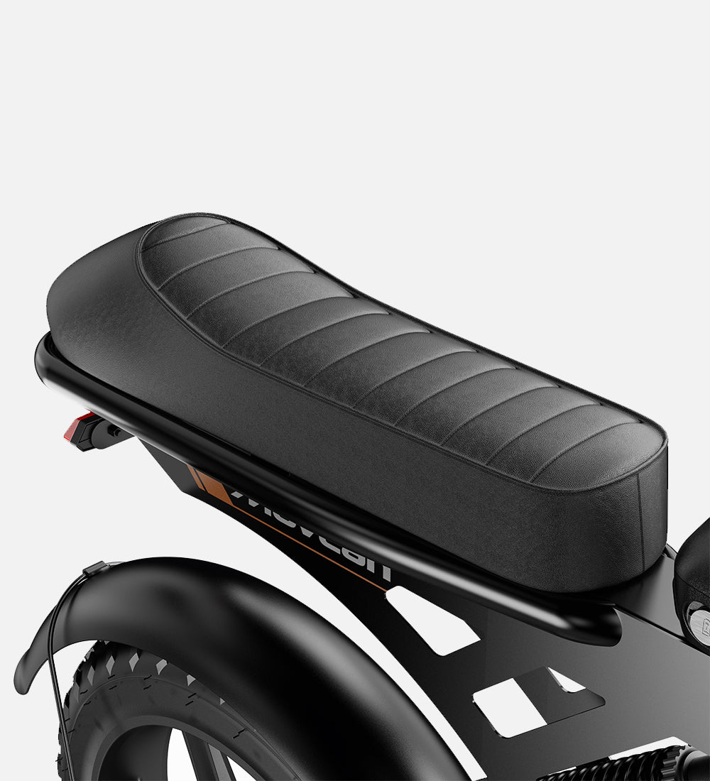 Ergonomic high-density foam seat for the Movcan V30, designed for shock absorption and comfort during long-distance rides.